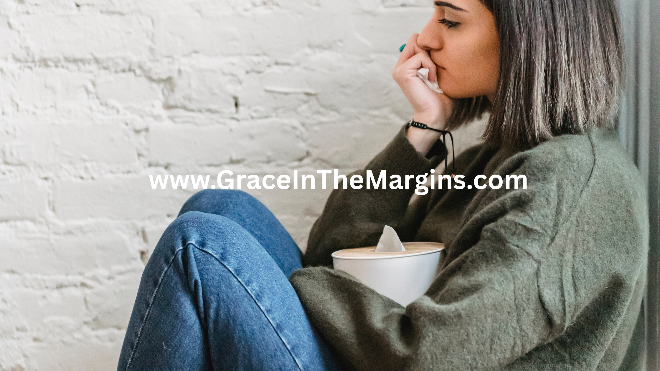 Person with head in hands expressing angry at God emotions in prayer and spiritual struggle