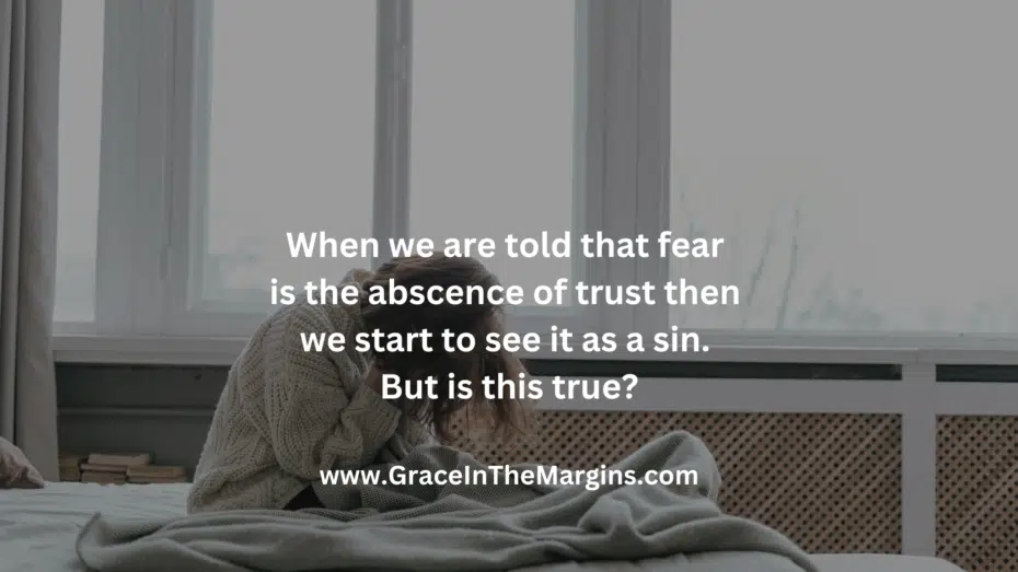 Exhausted woman sitting in bed at 3 AM wrestling with fear and wondering if anxiety and fear is sin